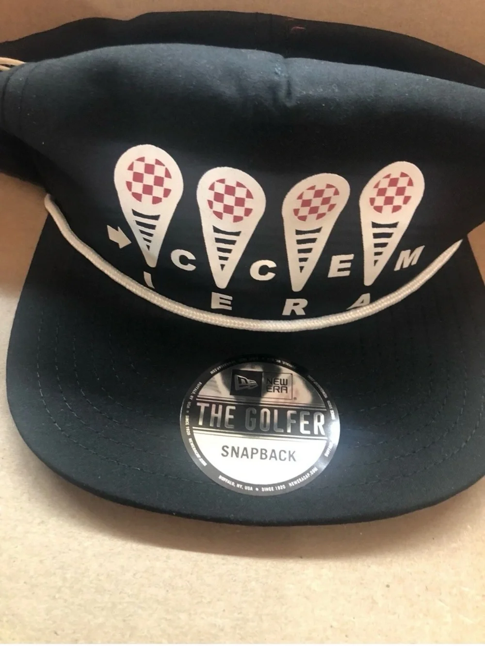 New Era Black and White Golf Snapback Hat